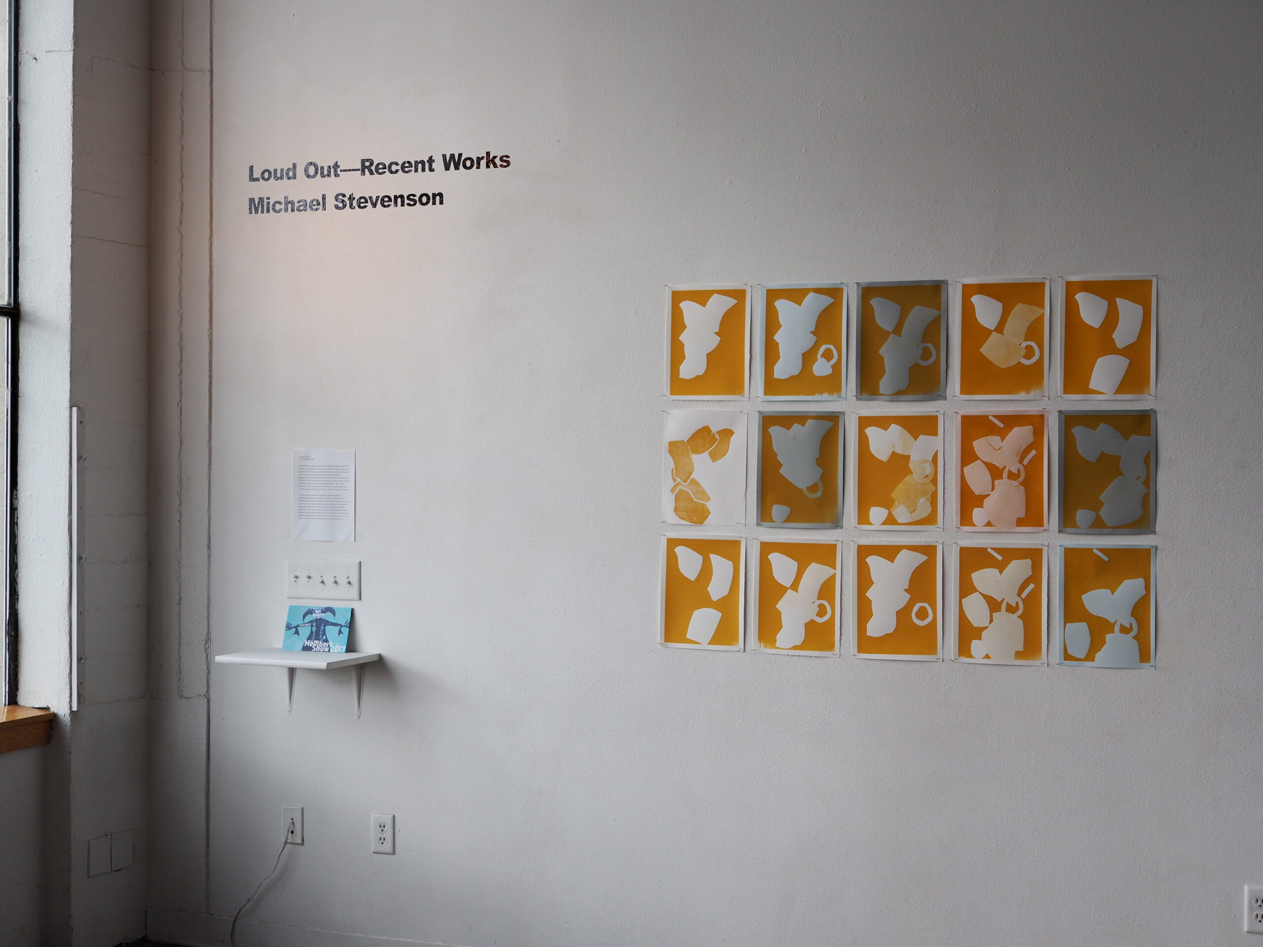 image of title wall for michael stevenson's exhibition of silkscreen monop[rint installations, called loud out, in chico california 2017